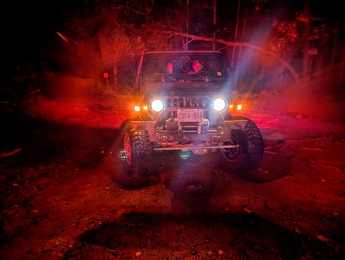 A Jeep crawling up rock at Minden Off-Road Park